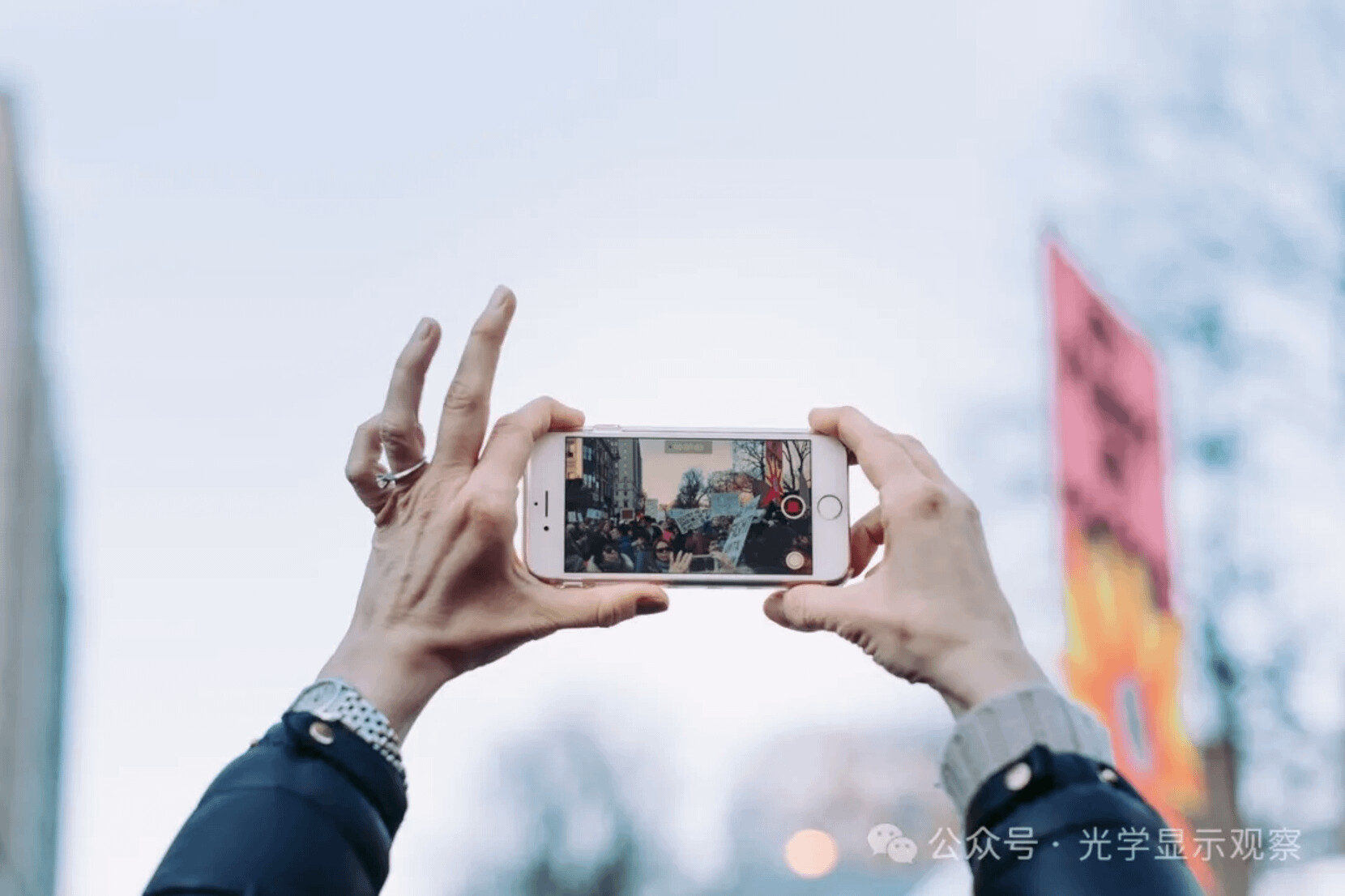 r/augmentedreality - A person holding a phone up in the air to take a picture